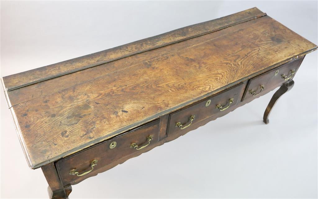 An early 18th century oak dresser base, W.5ft 7in. D.1ft 9in. H.2ft 7in.
